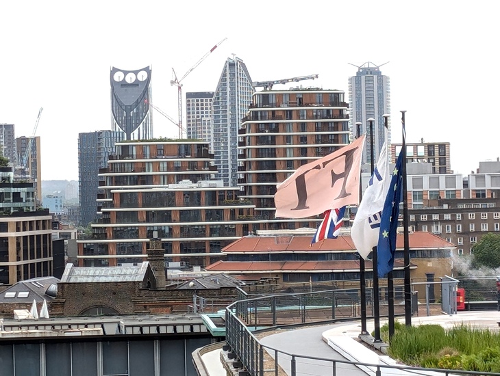 The top of the Financial Times building, with other high rises in the background