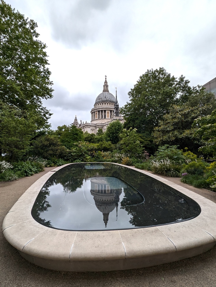 St Paul's reflected in a garden pool