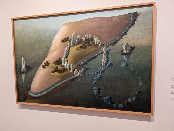 A painting of a land mass in the seam which could also be a woman's knee