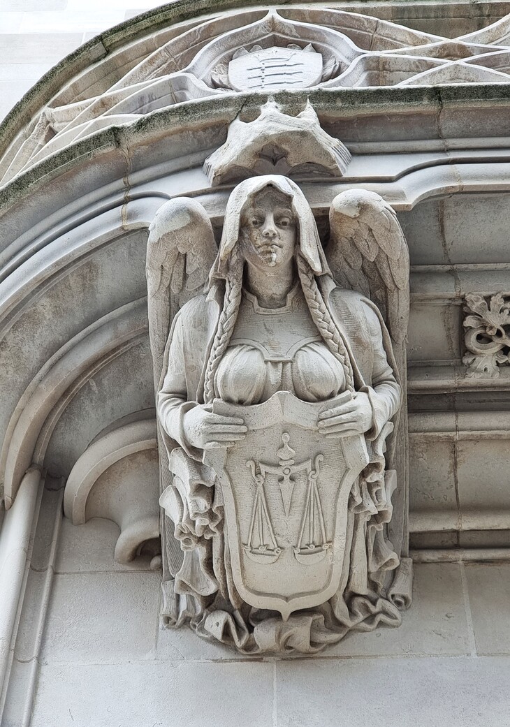 Statue of a buxom angel