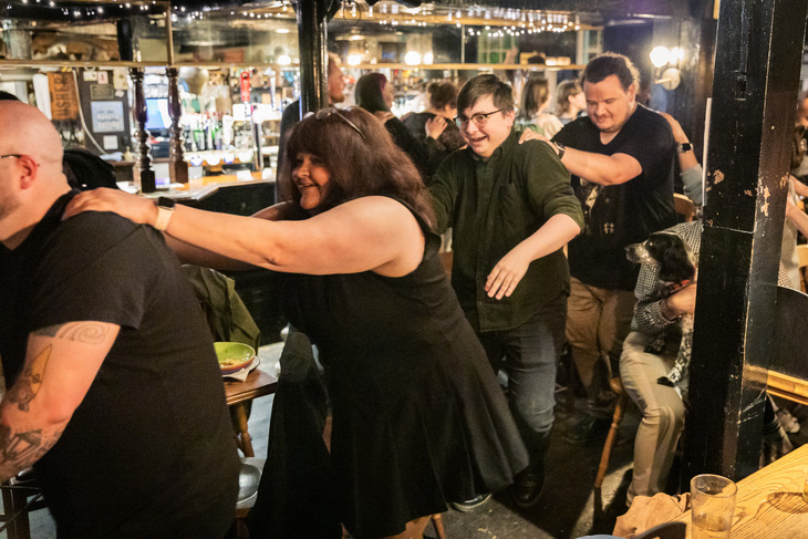 People doing the conga