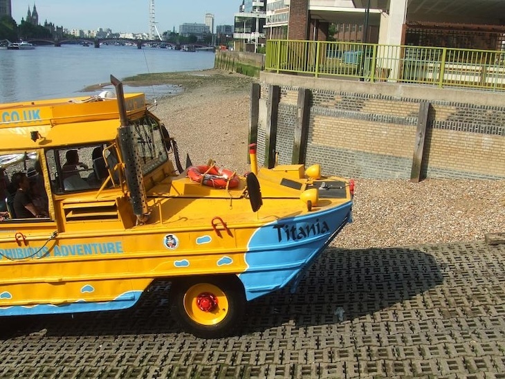 A Duck Tours boat riding up the ramp from the Thames at Vauxhall