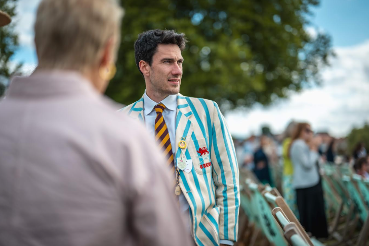 A man in a striped jacket at Henley Regatta