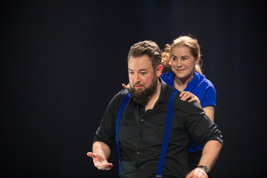 Two actors improvising on stage