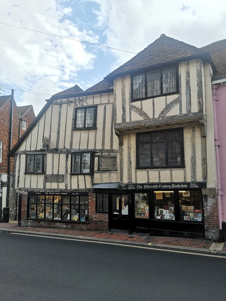 Things to do Lewes: the exterior of the Fifteenth Century Bookshop, with wooden beams and wonky windows