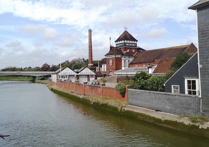 Visit Lewes: The Harvey's Brewery building next to the River Ouse