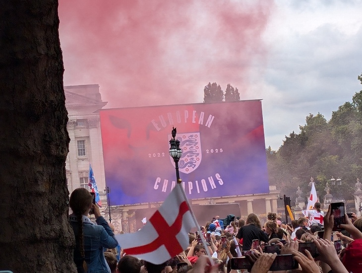 An explosion of red smoke and a screen declaring England champions