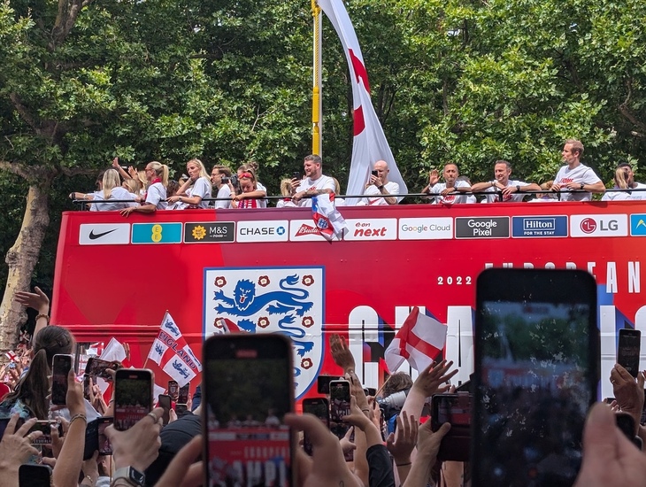 The open top bus going past