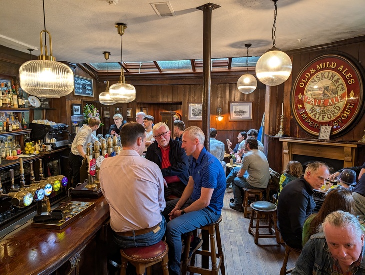 People drinking in the Holly Bush