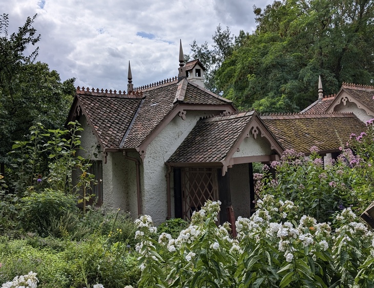 The cottage surrounded by flowers