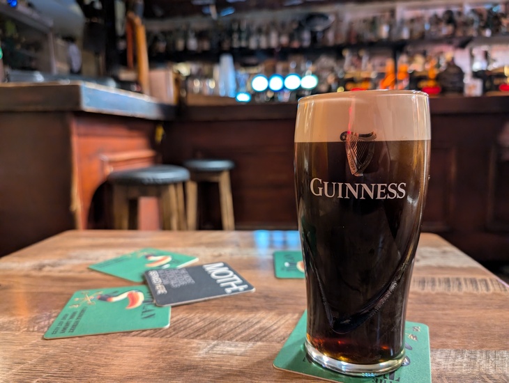 A pint of Guinness in a bar