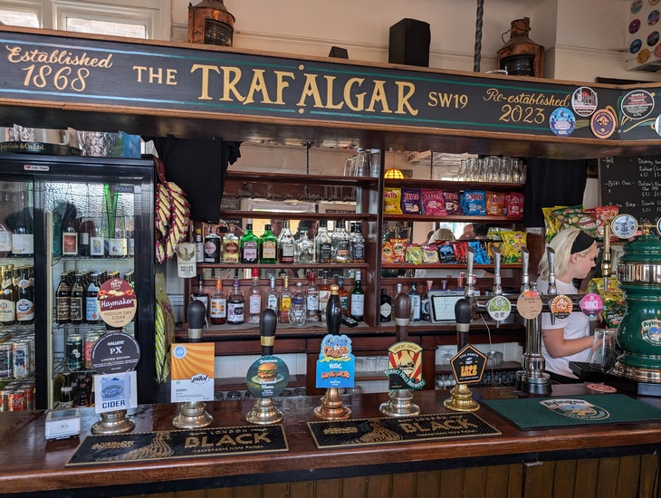 A bar with lots of beers on