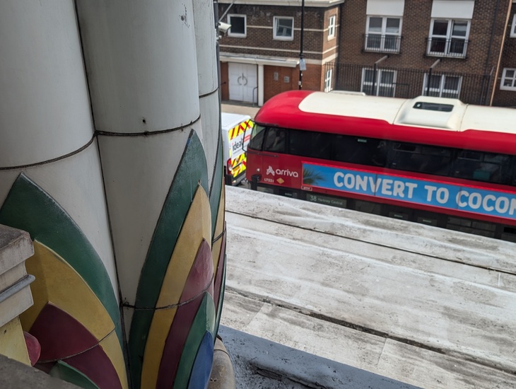 A bus driving past the window