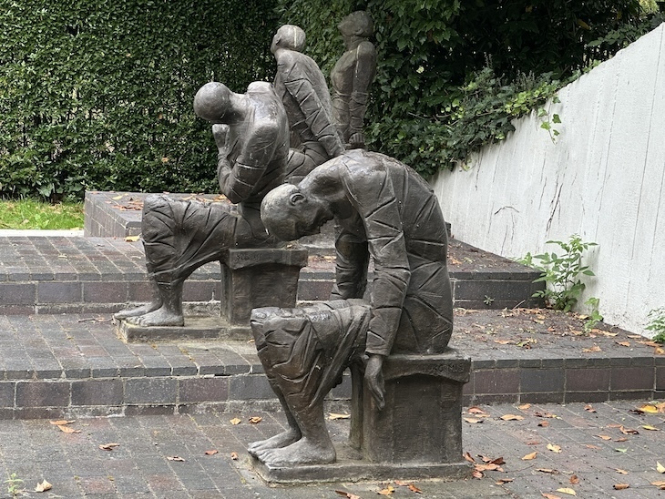 Sad figures in the holocaust memorial, gladstone park