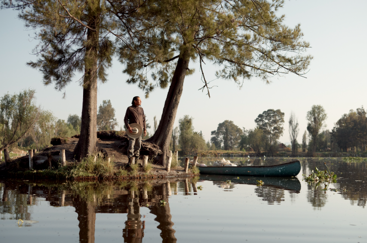 Things to do in London August 2025: a photograph of a person standing at the edge of a lake
