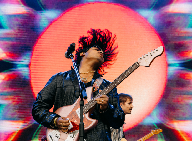 Things to do in London August 2025: a guitarist flipping their hair on stage