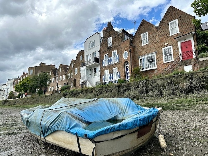 A boat on the thames foreshore at strand on the green