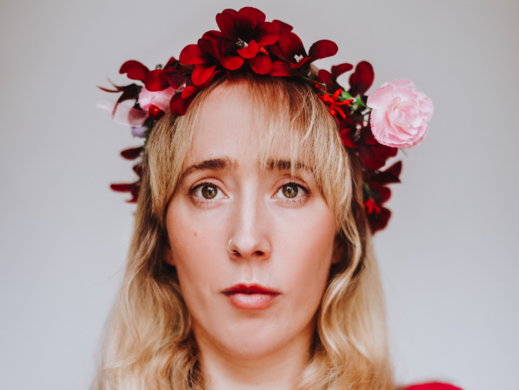 Things to do in London this weekend: a woman with blonde hair wearing a pink and red flower crown