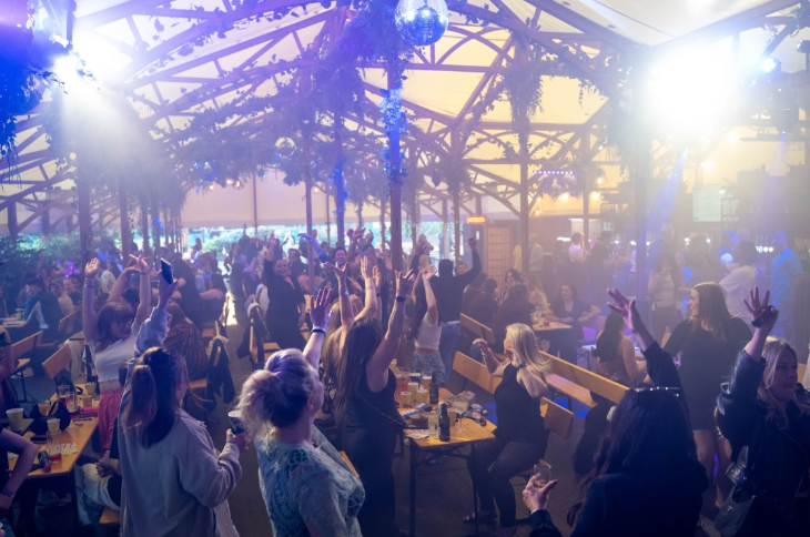Things to do today in London: people dancing inside a marquee at Between the Bridges