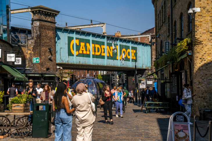 Things to do today in London: people walking through Camden Market