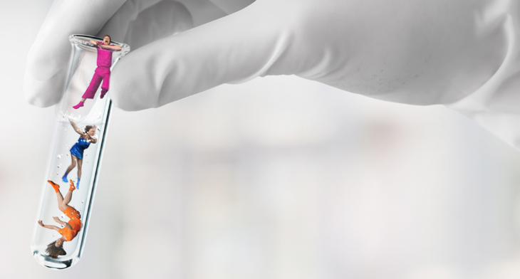 Things to do today in London: a giant hand wearing a white glove holding a test tube with tiny humans inside