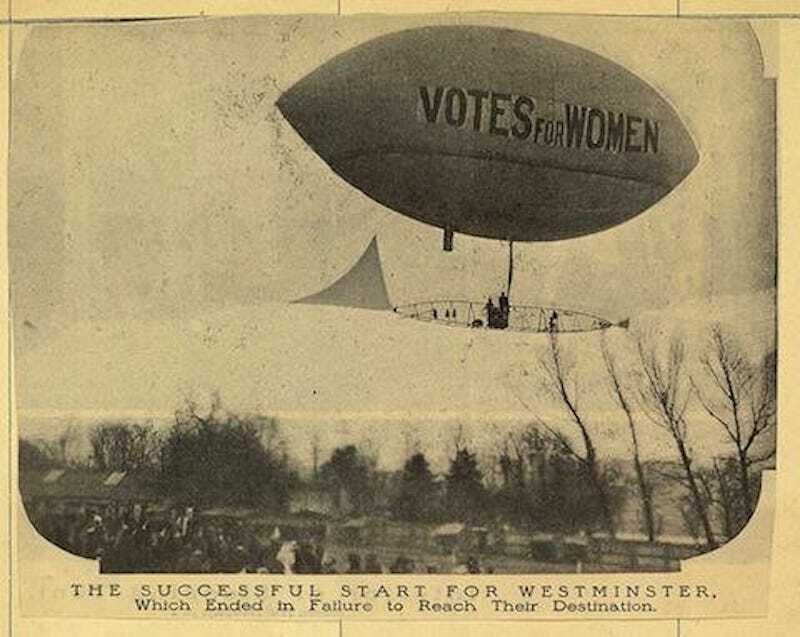 A blimp with Votes for Women written on the side with sufragettes onboard