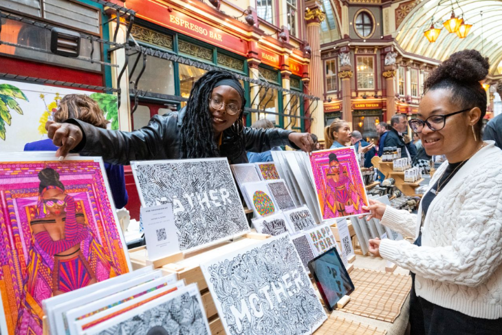 Things to do in London this weekend: a stallholder talking to a customer at a craft fair in Leadenhall