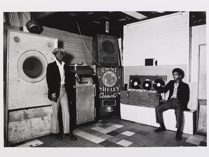 Two men with sound systems