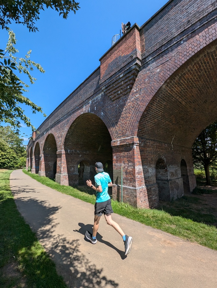 Someone jogging past the viaduct