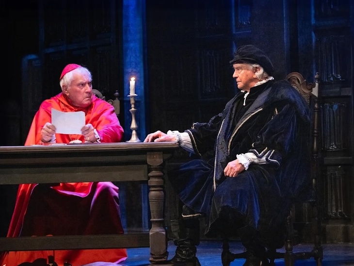 Two men acting in Tudor garb