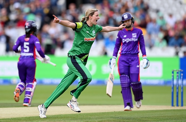 Cricket players celebrating