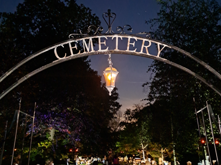 October half term 2025 events London: a lantern lighting an entrance to a cemetery