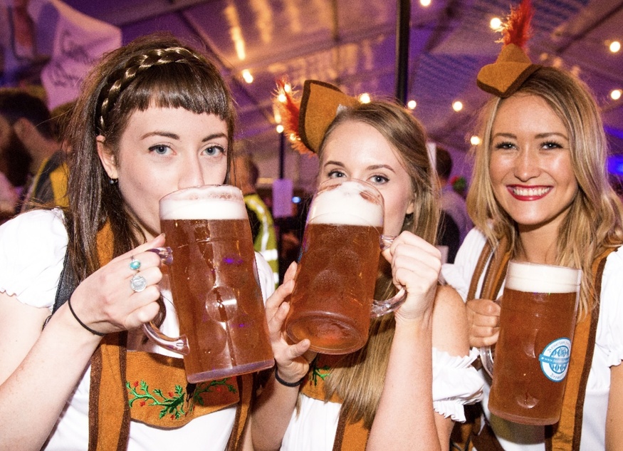 You women drinking beer from steins