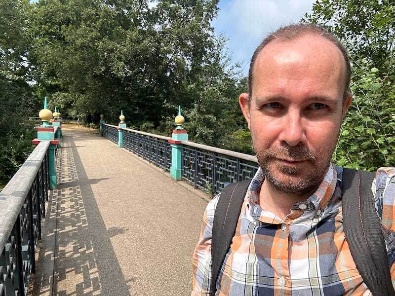Matt Brown of Londonist on a bridge in Victoria Park