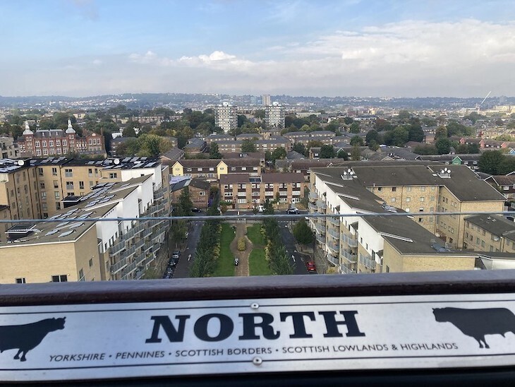Things to do in London August bank holiday weekend: views over a housing estate and into the distance from the Caledonian Clock Tower