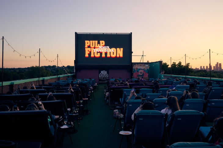 What's on in London today: people watching Pulp Fiction on a large screen at an open-air cinema