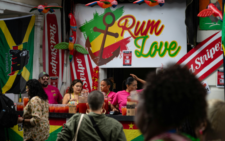 Things to do in London August bank holiday weekend: a rum stall at Notting Hill Carnival