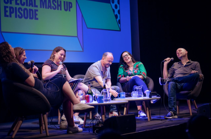 Things to do in London today:  Six people sitting on stage talking at the London Podcast Festival