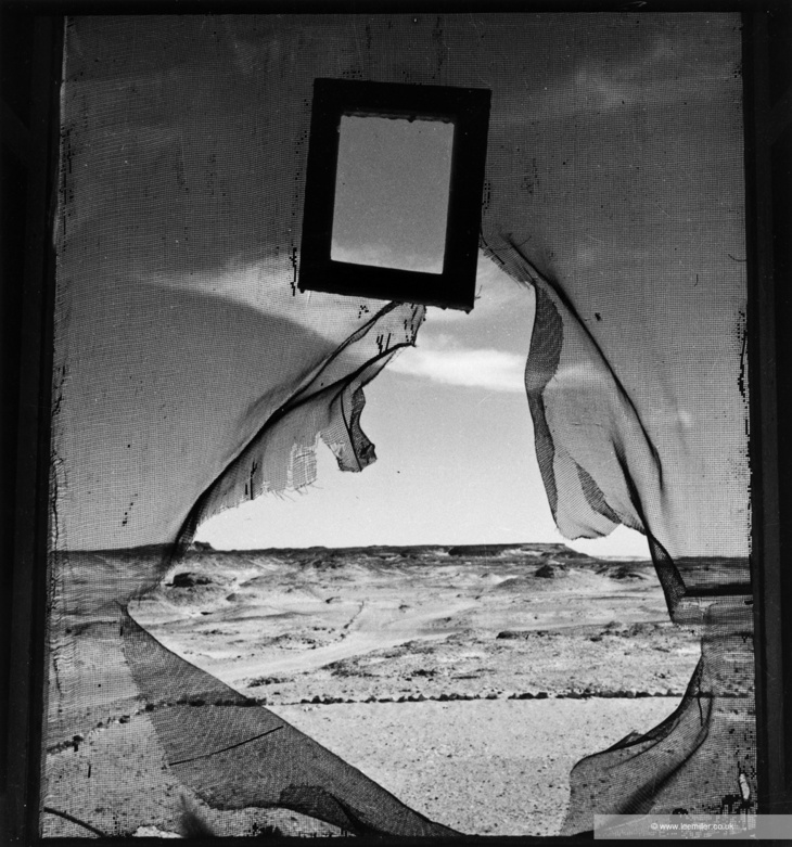 Desert framed by gauze
