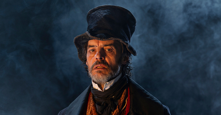 A miserly looking Scrooge