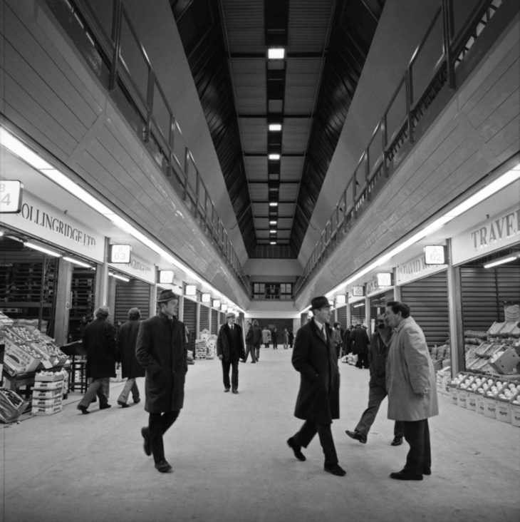 A photo of people walking around a brand new New Covent Garden Market