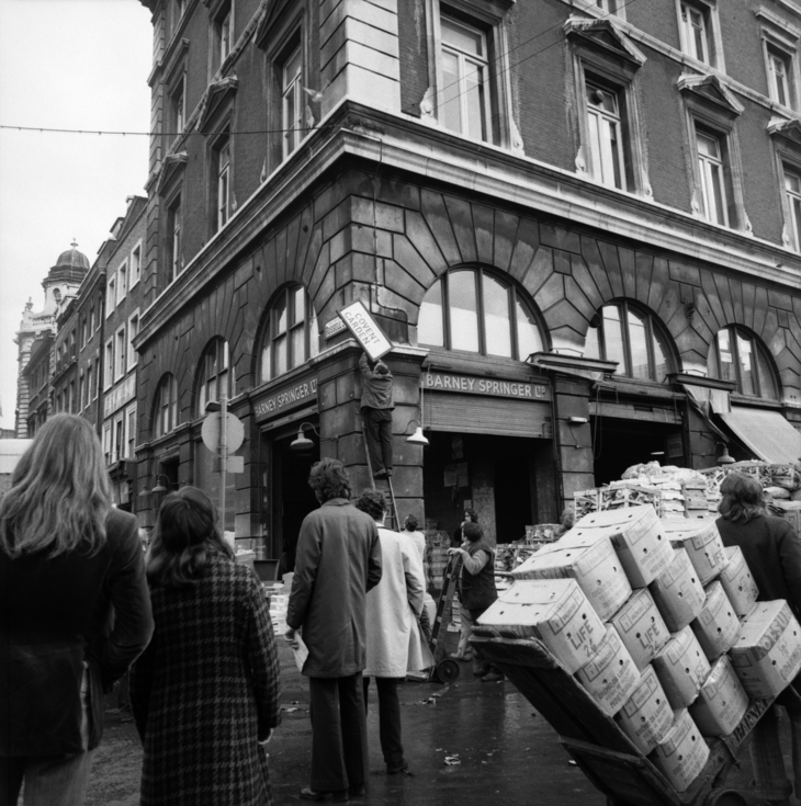 A Covent Garden sign being taken down