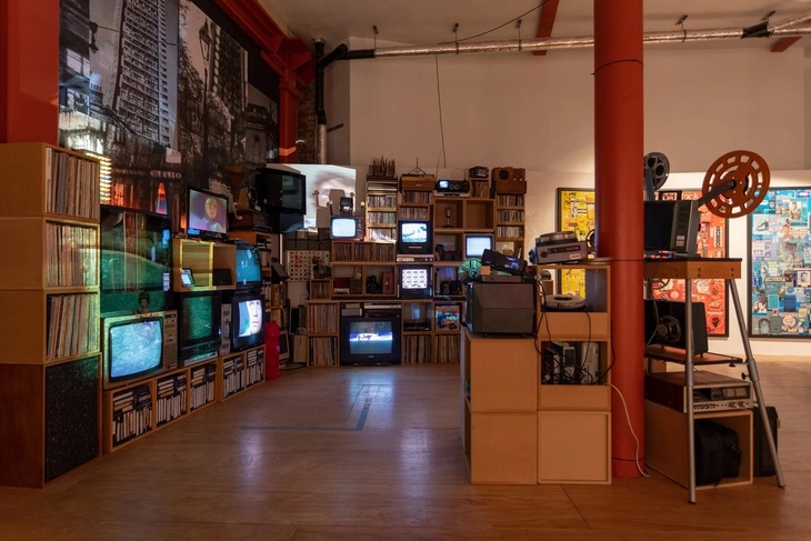 A room full of TV screens and film reels