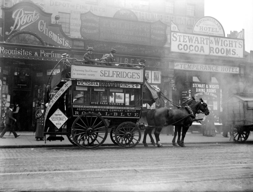 A horse omnibus advertising Selfridges