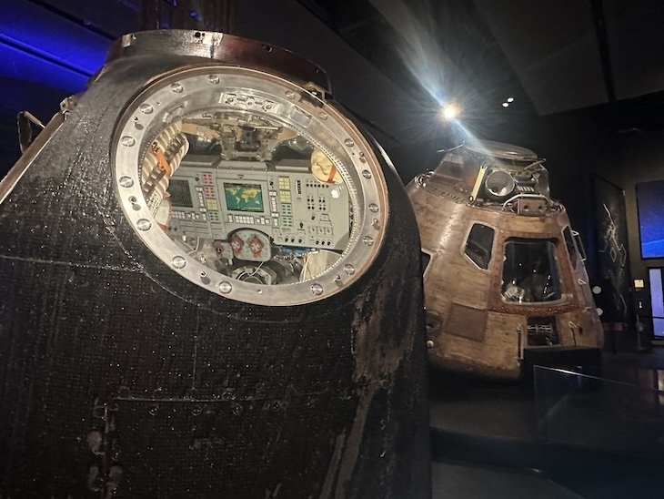 A soyuz and apollo capsule side by side.