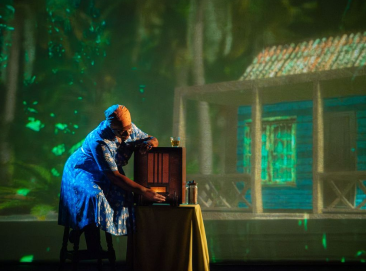 Things to do in London in October 2025: a woman in front of a large-scale video projection