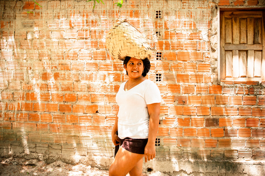 Things to do in London this weekend: a photograph of a woman with a basket on her head