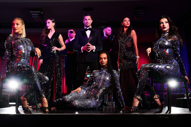Things to do in London this weekend: The cast of London Never Dies posing for a photo in black tie outfits