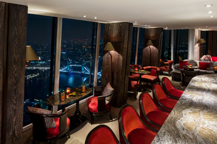 Things to do in London today: a bar with views over Tower Bridge and the Thames below at night