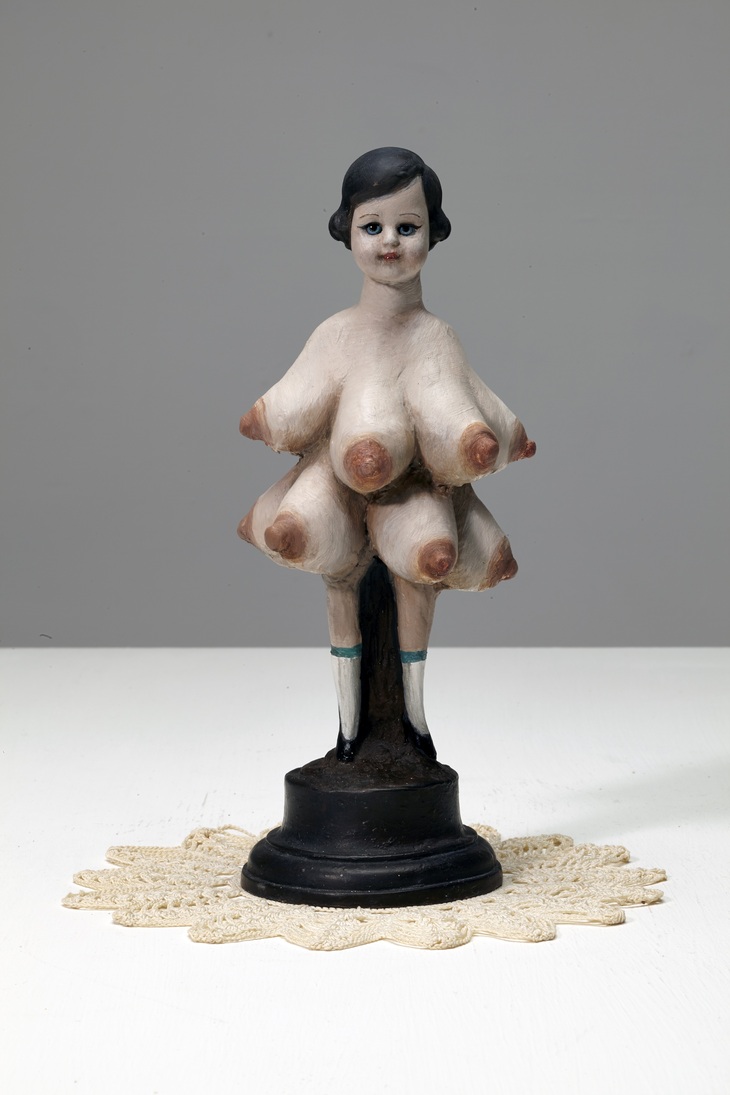 Figure of a many-breasted woman